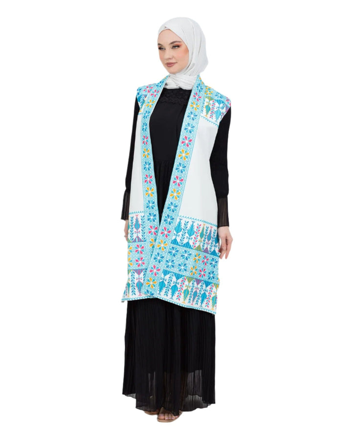 - This Traditional Palestinian Embroidered Long Vest Offers Elegance And Style Together. - Colored With The Nobility Of Blue, This Vest Easily Adapts To Any Style. - It Is Made Of High Quality Materials And Offers Maximum Comfort To The User. - It Can Be Easily Preferred Both In Daily Life And On Special Occasions Depending On The Situation - It Draws Attention With Its Elegant Details And Reveals Its Difference. - Thanks To Its Body-Hugging Cut, It Gives You A Nice Look While Not Restricting Your Mobility.