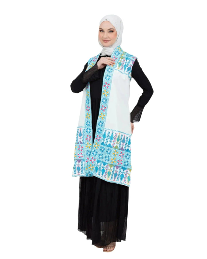 - This Traditional Palestinian Embroidered Long Vest Offers Elegance And Style Together. - Colored With The Nobility Of Blue, This Vest Easily Adapts To Any Style. - It Is Made Of High Quality Materials And Offers Maximum Comfort To The User. - It Can Be Easily Preferred Both In Daily Life And On Special Occasions Depending On The Situation - It Draws Attention With Its Elegant Details And Reveals Its Difference. - Thanks To Its Body-Hugging Cut, It Gives You A Nice Look While Not Restricting Your Mobility.