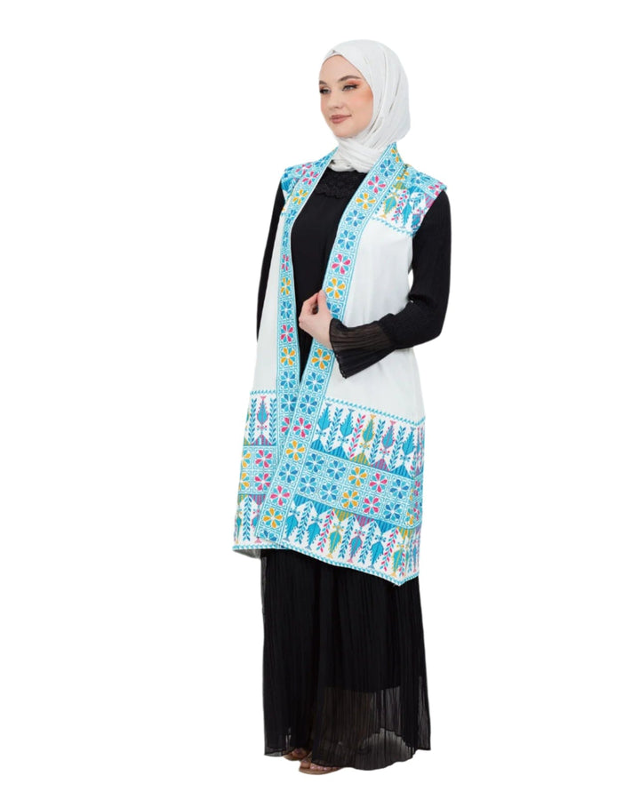 - This Traditional Palestinian Embroidered Long Vest Offers Elegance And Style Together. - Colored With The Nobility Of Blue, This Vest Easily Adapts To Any Style. - It Is Made Of High Quality Materials And Offers Maximum Comfort To The User. - It Can Be Easily Preferred Both In Daily Life And On Special Occasions Depending On The Situation - It Draws Attention With Its Elegant Details And Reveals Its Difference. - Thanks To Its Body-Hugging Cut, It Gives You A Nice Look While Not Restricting Your Mobility.