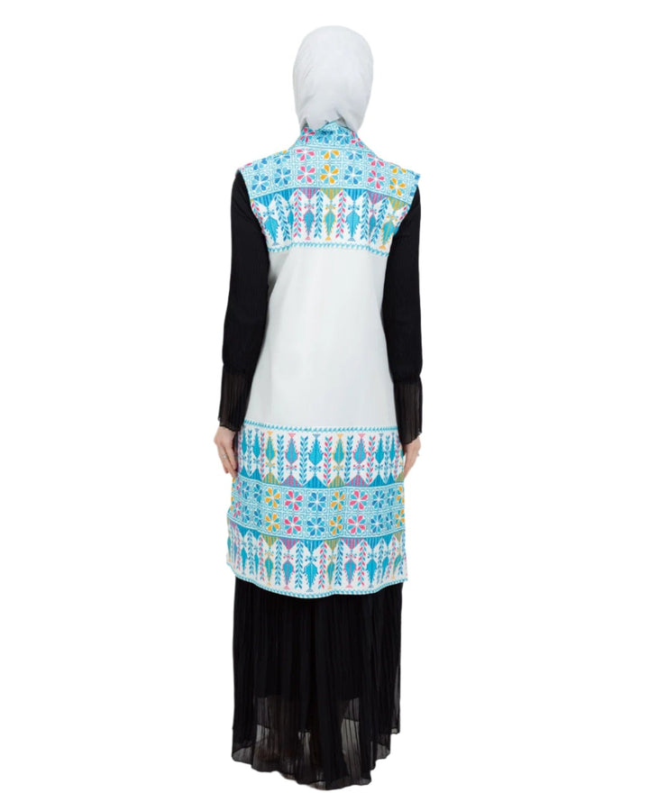- This Traditional Palestinian Embroidered Long Vest Offers Elegance And Style Together. - Colored With The Nobility Of Blue, This Vest Easily Adapts To Any Style. - It Is Made Of High Quality Materials And Offers Maximum Comfort To The User. - It Can Be Easily Preferred Both In Daily Life And On Special Occasions Depending On The Situation - It Draws Attention With Its Elegant Details And Reveals Its Difference. - Thanks To Its Body-Hugging Cut, It Gives You A Nice Look While Not Restricting Your Mobility.