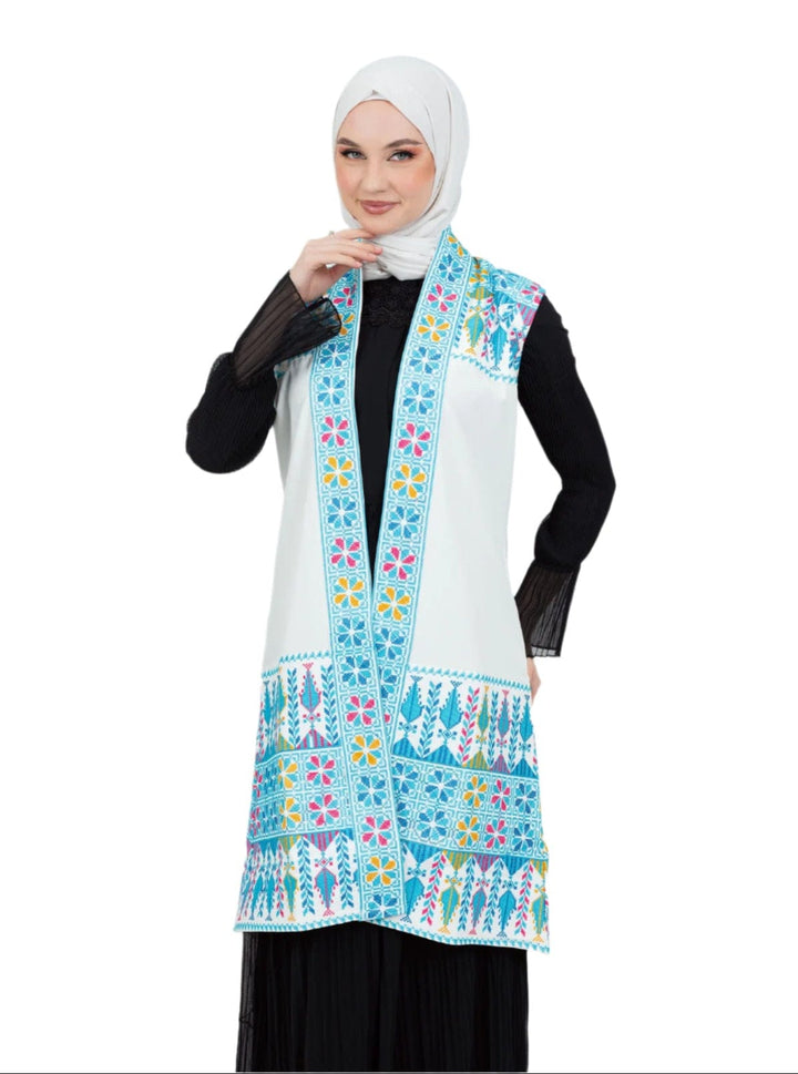 - This Traditional Palestinian Embroidered Long Vest Offers Elegance And Style Together. - Colored With The Nobility Of Blue, This Vest Easily Adapts To Any Style. - It Is Made Of High Quality Materials And Offers Maximum Comfort To The User. - It Can Be Easily Preferred Both In Daily Life And On Special Occasions Depending On The Situation - It Draws Attention With Its Elegant Details And Reveals Its Difference. - Thanks To Its Body-Hugging Cut, It Gives You A Nice Look While Not Restricting Your Mobility.