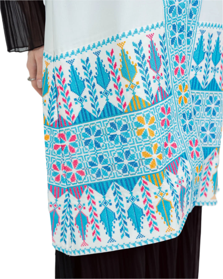 - This Traditional Palestinian Embroidered Long Vest Offers Elegance And Style Together. - Colored With The Nobility Of Blue, This Vest Easily Adapts To Any Style. - It Is Made Of High Quality Materials And Offers Maximum Comfort To The User. - It Can Be Easily Preferred Both In Daily Life And On Special Occasions Depending On The Situation - It Draws Attention With Its Elegant Details And Reveals Its Difference. - Thanks To Its Body-Hugging Cut, It Gives You A Nice Look While Not Restricting Your Mobility.
