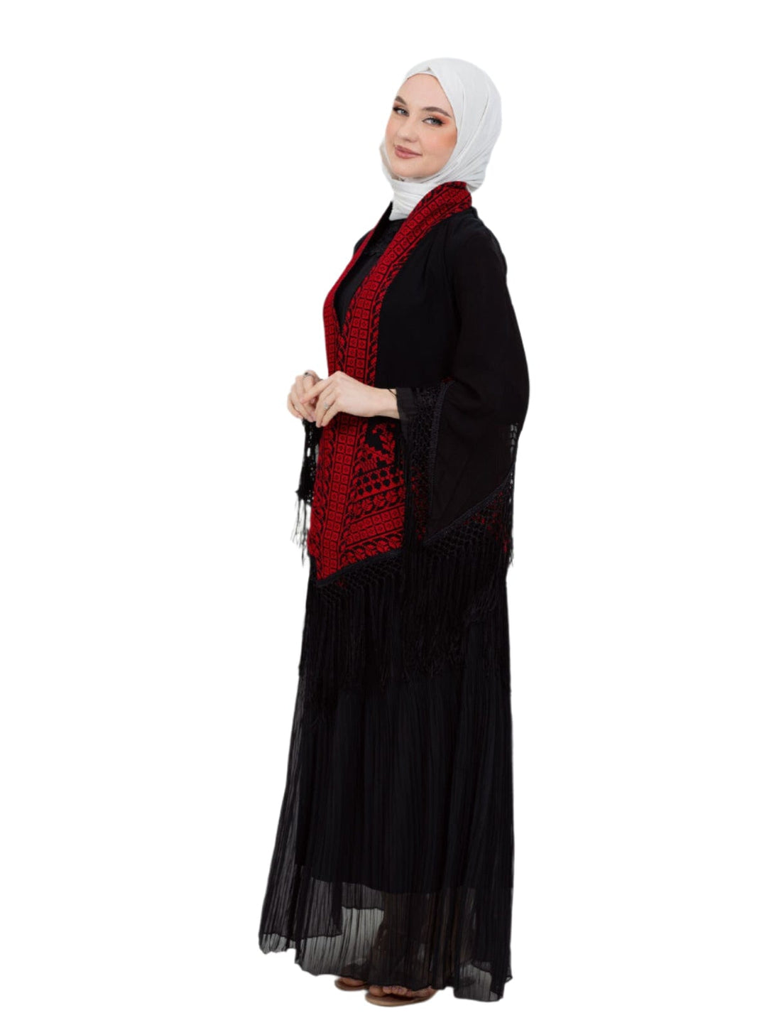 Shine with a touch of authenticity and heritage in this luxurious deep black jacket, adorned with rich and intricate Palestinian embroidery in vibrant red.