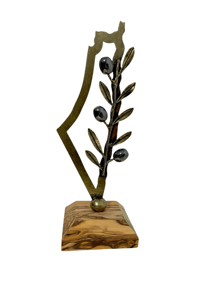 Decorative item with olive branch design on a wooden base against a white background