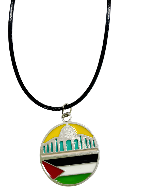 Necklace with a pendant featuring the colors of the Palestinian flag on a white background