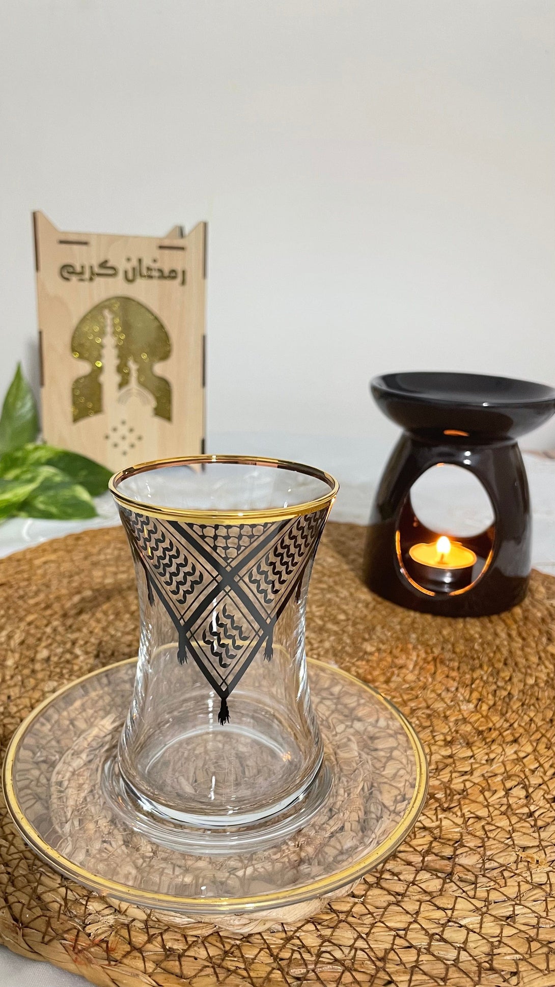 Acquire elegance and heritage with this tea glass set, designed to add a touch of authentic beauty to your tea-drinking experience. Each glass is adorned with intricate Palestinian Keffiyeh patterns, blending luxury with authenticity. The set comprises 6 elegant tea glasses and 6 matching saucers, all embellished with enhancing rims. Available in luxurious colors: radiant golden, a distinctive golden and black combination, or elegant silver to suit various tastes and decors.