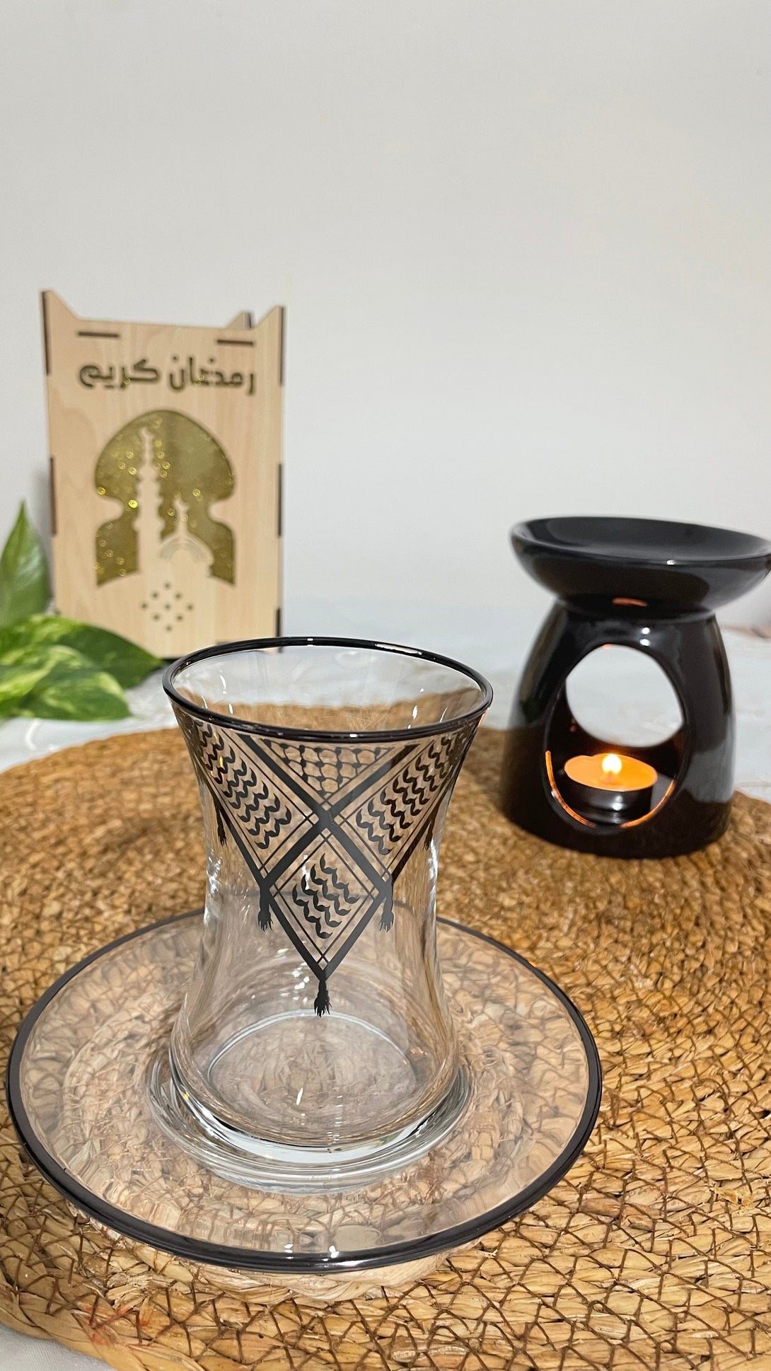 Acquire elegance and heritage with this tea glass set, designed to add a touch of authentic beauty to your tea-drinking experience. Each glass is adorned with intricate Palestinian Keffiyeh patterns, blending luxury with authenticity. The set comprises 6 elegant tea glasses and 6 matching saucers, all embellished with enhancing rims. Available in luxurious colors: radiant golden, a distinctive golden and black combination, or elegant silver to suit various tastes and decors.