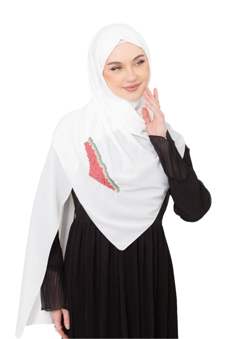 An elegant light grey Shawl&nbsp;, made from high-quality polyester and measuring 70 x 180 cm. It features unique and beautiful embroidery of the map of Palestine, in colors inspired by the watermelon (red, green, black, and white), which has be
