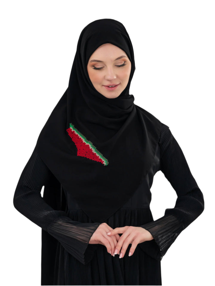 Wear your identity with pride and elegance.
This black shawl is made from soft, high-quality polyester and features a beautifully hand-embroidered map of Palestine in watermelon colors — red, green, white, and black — a symbol of heritage, resistance, and solidarity.